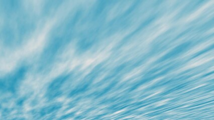 Diagonal movement of striped clouds in a blue sky .