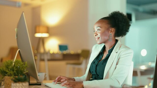 Night, business and black woman with computer, typing and data analytics in workplace. Nigerian female employee, happy manager and entrepreneur with pc, search internet and update website information