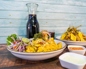 rice with seafood and mixed jelly. chicha morada, chili and canchita serrana