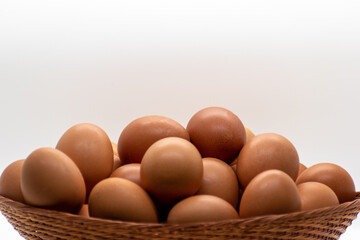 organic eggs in a basket closeup