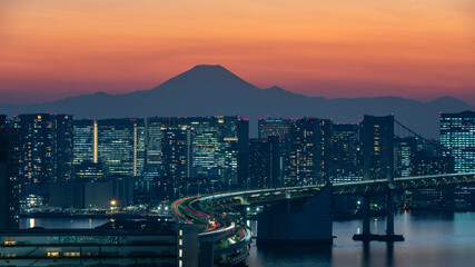 Tokyo city skyline with rainbow bridge and fuji at sunset.jpg