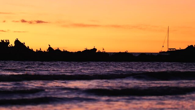 Glenelg Beach Dock At Sunset At Glenelg Beach Rocks With Seagulls As Sun Setting