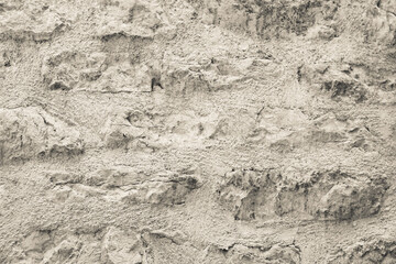 Old castle stone wall texture, close-up. Background from stone masonry for publication, design, poster, calendar, post, screensaver, wallpaper, postcard, banner, cover, website. High quality photo