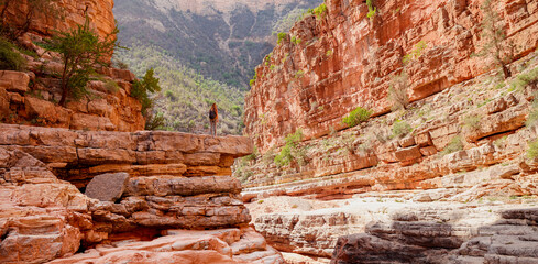 Happy woman tourist in Moroccan canyon- travel,  adventure,  tourism- Agadir © M.studio