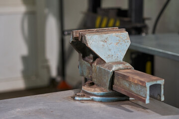 large cast iron locksmith vise in a locksmith shop