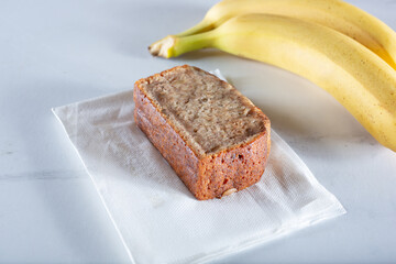 A view of a thick slice of banana bread.