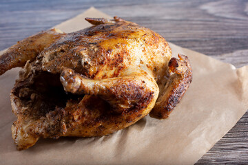 A view of a smoked whole chicken.