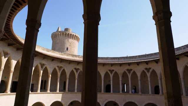 Inside view of the Bellver Castle in Palma de Mallorca, Spain. Pan shot over the Archs on the first floor of the Castle.