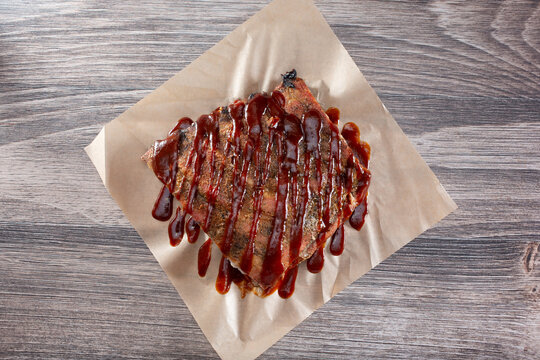 A top down view of a half rack of spare ribs.
