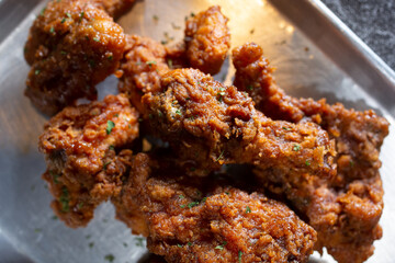 A top down view of a tray of Korean fried chicken.