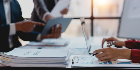 Group of business people meeting for business plan Analyze corporate growth graph and chart.