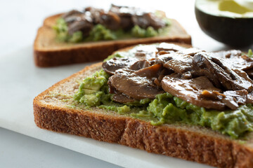 A closeup view mushroom avocado toast.