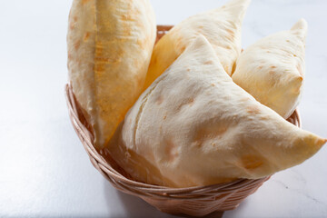 A view of basket of pita bread.