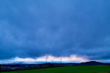 wind generators at a stormy day
