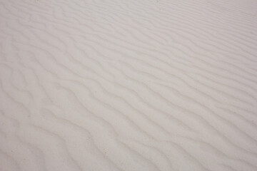 Fototapeta na wymiar A view of sand dune wind texture, seen at the White Sands National Park.