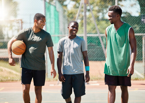 Black men, team building or bonding on basketball court in fitness break, workout or training in competition, game or match. Smile, happy or talking ball players, friends or community sports athletes