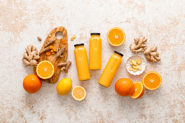 Smoothie. Healthy fresh raw detox citrus smoothie with orange, lemon, ginger and turmeric in a...