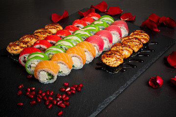 tasty sushi on the black background