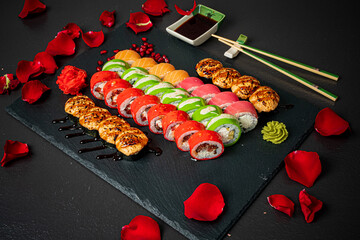 tasty sushi on the black background