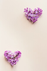 Beautiful flower arrangement. Mockup. Lilac flowers, free space for text on light pastel background. Wedding, birthday. Valentine's Day, Mother's Day. top view, copy space