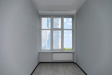New empty room with clean windows and white walls