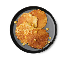 Black plate with tasty corn pancakes on white background, top view