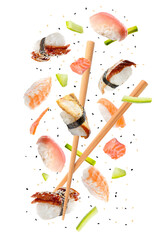 Nigiri sushi and wooden chopsticks flying on white background