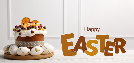 Happy Easter greeting card with decorated cake and eggs on white wooden table. Banner design