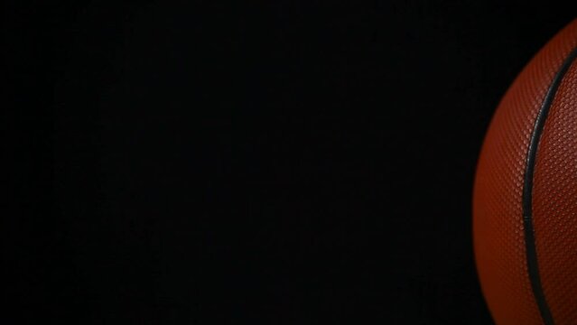 footage of basketball dark background