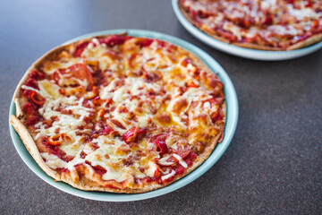 vegetarian pizza with capsicum and plant-based bacon