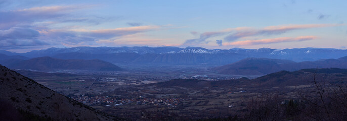 Fototapeta na wymiar Panoramic view from Sirente Velino Natural Regional Park in Abruzzo at dawn, Italy 