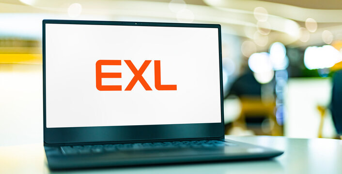 Laptop computer displaying logo of EXL Service