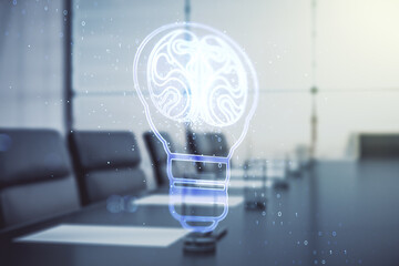 Double exposure of abstract virtual creative light bulb hologram with human brain on a modern...