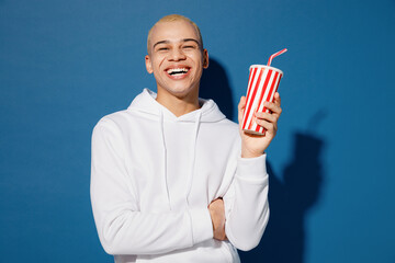 Young smiling happy fun dyed blond man of African American ethnicity wear white hoody hold in hands...