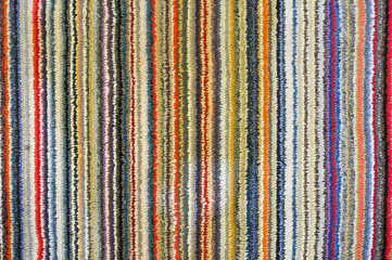 carpet of colorful vertical stripes can be used as a background