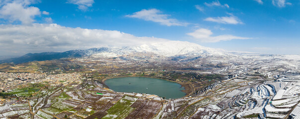 Israel Hermon mountain covered with snow and Ram lake