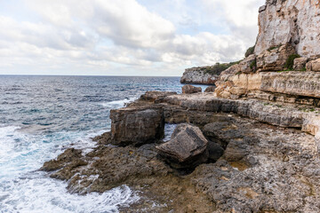 Cliffs, beaches and coves in the south of the island of Mallocar in the Balearic Islands in Spain. Mediterranean coast.