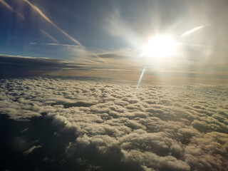 the beauty of clouds in the afternoon on an airplane
