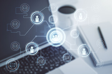 Double exposure of social network icons concept with modern laptop on background. Marketing and promotion concept