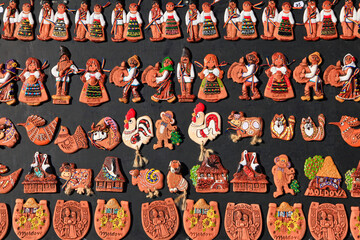 Moldavian handmade souvenir magnets in a souvenir shop. - 577962959