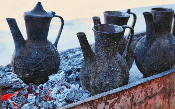 National teapots in which water is boiled on coals or on a fire.