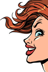 The developing hair of the client. Ambitious and domineering look. A woman with red hair looks up.