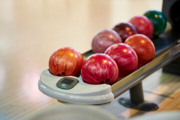 Bowling balls in stand. Colored bowling balls at bowling alley,relaxing and sport concept.