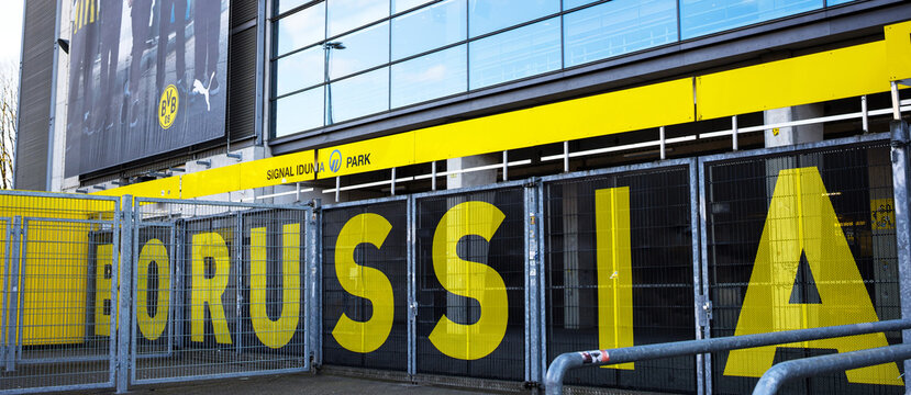 dortmund, north rhine westphalia, germany - 28 02 2023: a dortmund bvb logo on the westfalenstadion panorama