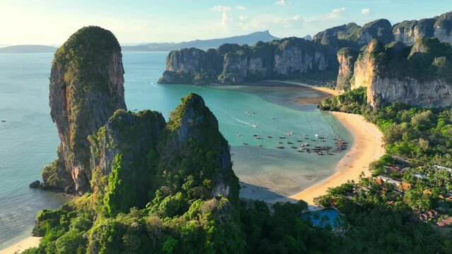 drone view of Krabi coast in Thailand, idyllic lagoon with cliffs on Railay beach, tropical Thai resort seascape