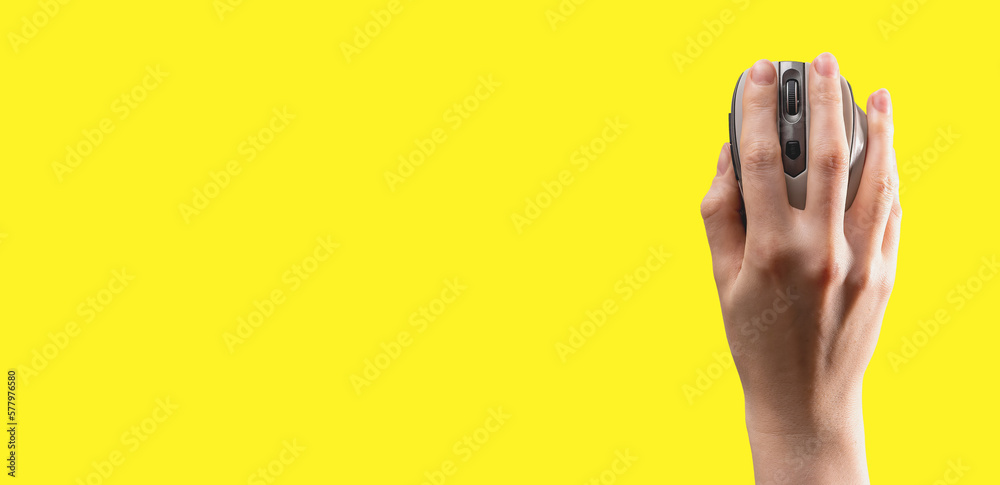 Poster Hand lying on computer mouse, op view. Ad yellow banner, background with copy space for text