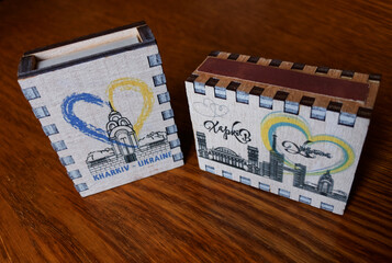 Wooden boxes of matches with the image of Kharkov.