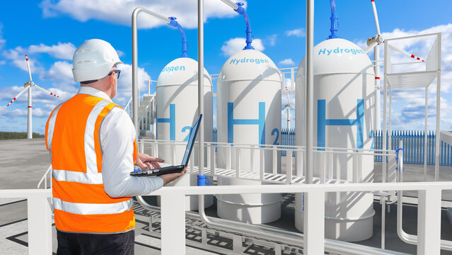 Hydrogen h2 energy. Man near power plant. Environmentally friendly electricity. Power plant engineer with his back to camera. Getting energy from h2 hydrogen. Hydrogen technologies.