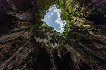 Naklejka premium Batu caves limestone mountains cave view fron the bottom in Kuala Lumpur Malaysia