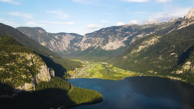 Panorama view of Hallstattersee lake and mountain in sunset, stock video of Austria nature